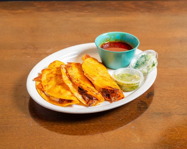 #8 Birria Street Tacos.